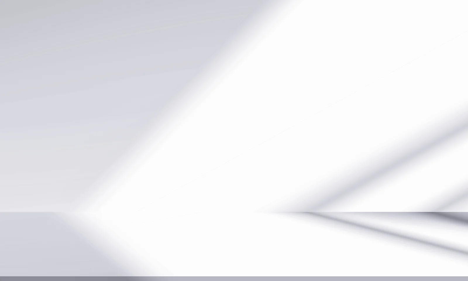 Soft abstract composition featuring white and grey gradients with diagonal light streaks creating a sense of motion and depth.