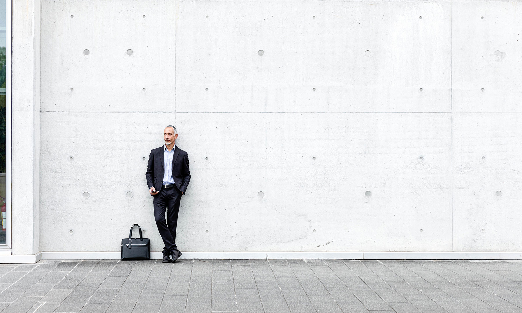 Business professional with briefcase in modern urban setting gft-image-mood-27.jpg