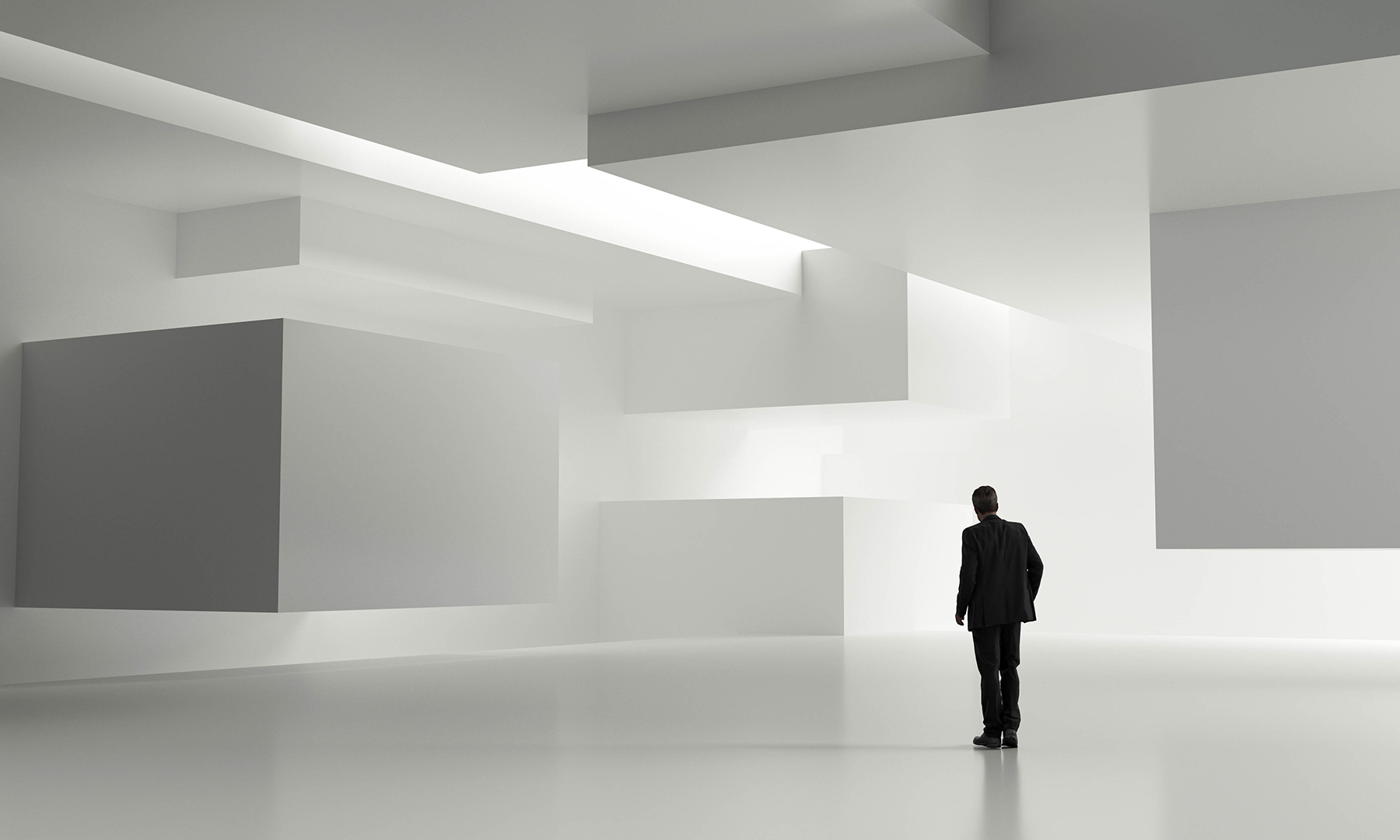 Business Professional Exploring Futuristic Architectural Space Man in a black suit standing in a large minimalistic room with floating geometric structures and soft white lighting.
