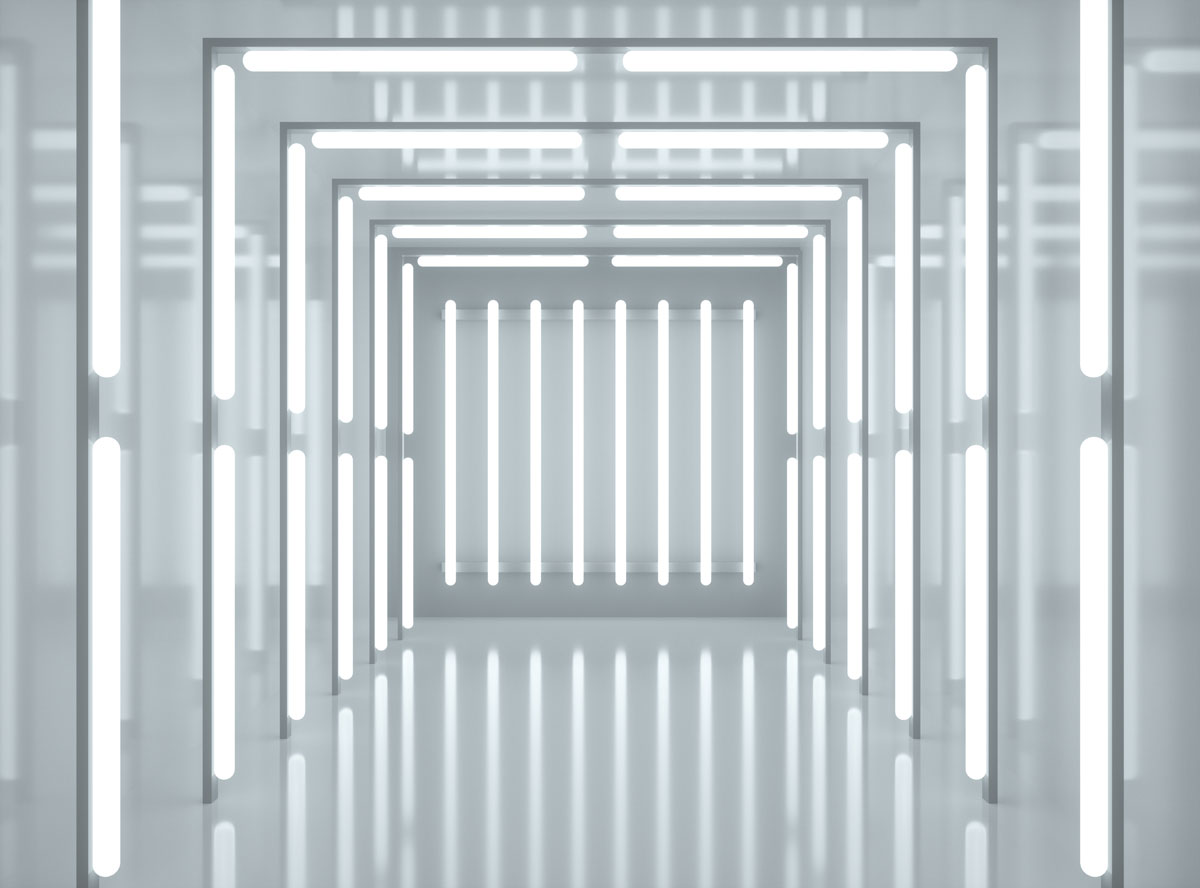 Data uncovered 03 A futuristic corridor illuminated by linear LED lights, creating a tunnel-like effect with reflections on the floor.